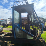 CARREGADEIRA NEW HOLLAND TS 6000 DANIFICADA, ANO 2011, DANIFICADA, FROTA 0620005, CHASSI ZBCE91735, (OBS: CABINE DANIFICADA, COM MOTOR), NÃO VAI A MEIA LANÇA