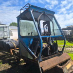 CARREGADEIRA NEW HOLLAND TS 6000 DANIFICADA, ANO 2011, DANIFICADA, FROTA 0620005, CHASSI ZBCE91735, (OBS: CABINE DANIFICADA, COM MOTOR), NÃO VAI A MEIA LANÇA