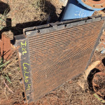 RADIADOR + BASE C/ BOMBA AC E ROLETES DE ESTEIRA AC